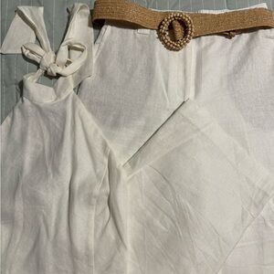 Elegant white wide-leg set with statement tan belt